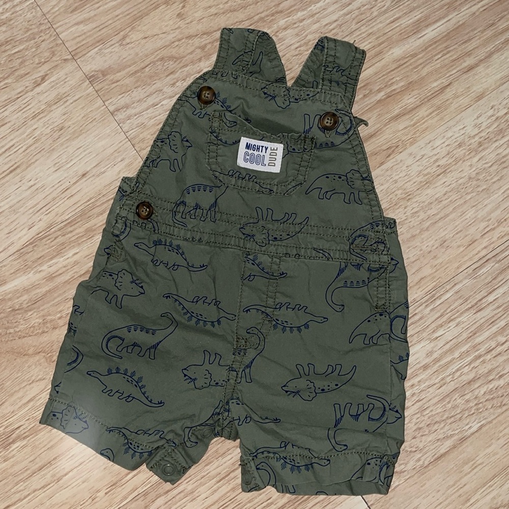 Carter’s - Just For One Dinosaur Overalls in Green.